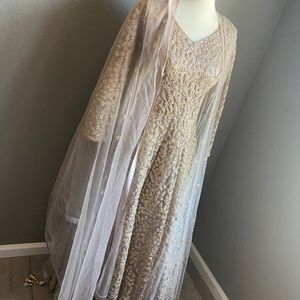 Gown with all over thread work and sheer jacket